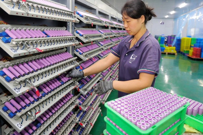 A woman works in a factory producing lithium batteries in Huaibei in central China