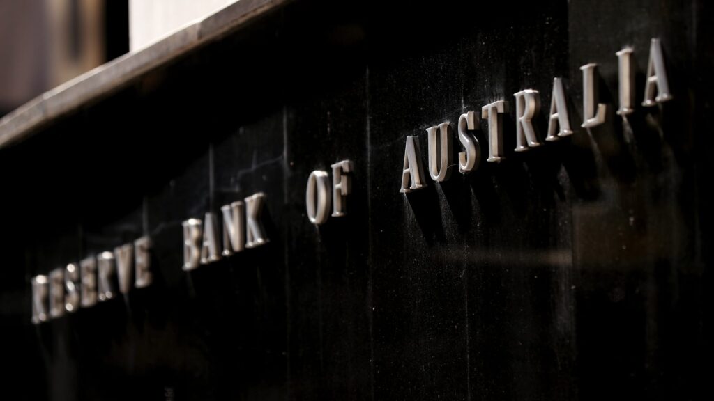 Australia central bank cuts rates for the first time in more than four years, flags economic uncertainties