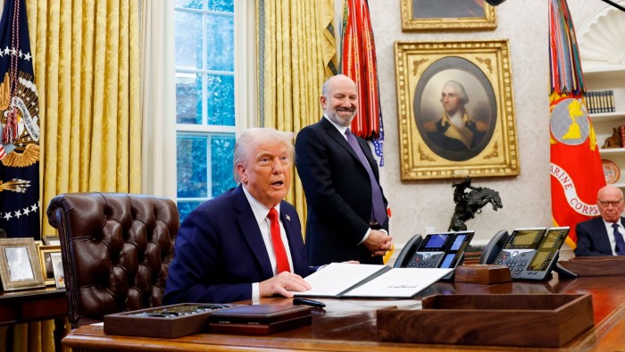 US President Donald Trump speaks to reporters in the Oval Office of the White House on Monday