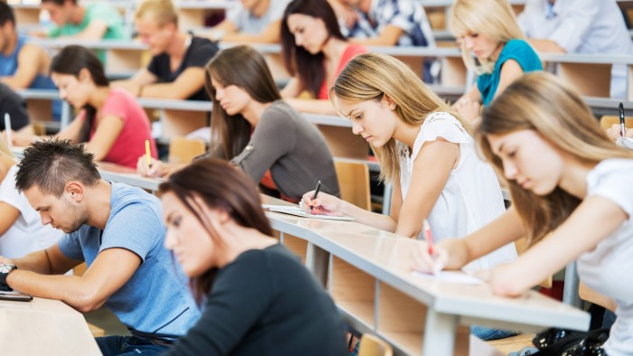 Group of college students in a university amphitheatre