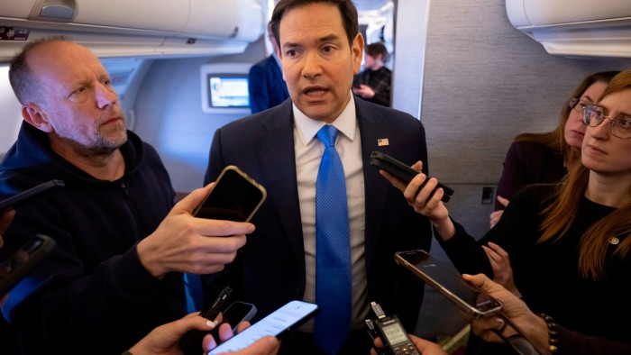 Marco Rubio speaks to the media on his military aeroplane as he flies to Jeddah, Saudi Arabia, on Monday, March 10 2025