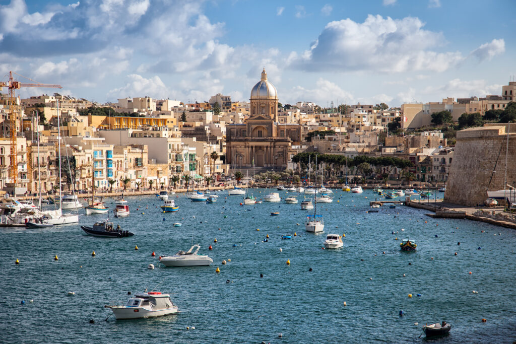 Sailing boats on Senglea marina in Grand Bay, Valetta, Malta.