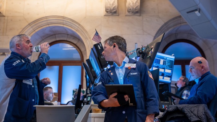 Traders on the floor of the New York Stock Exchange