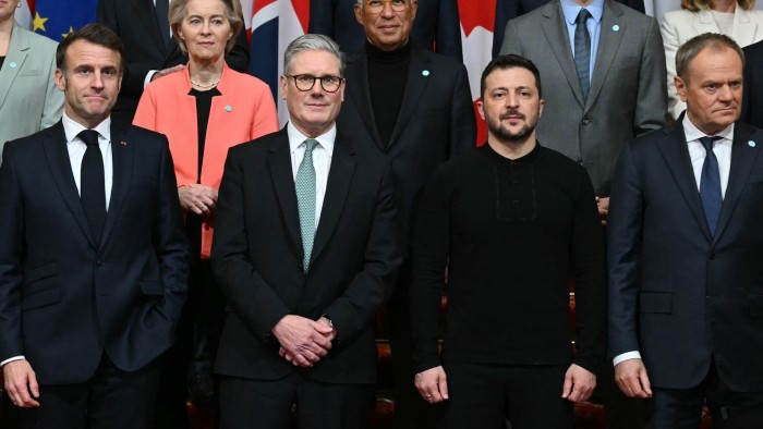 A cropped photo shows Ursula von der Leyen and António Costa standing behind Emmanuel Macron, Sir Keir Starmer, Volodymyr Zelenskyy and Donald Tusk during a summit held at Lancaster House in central London on March 2