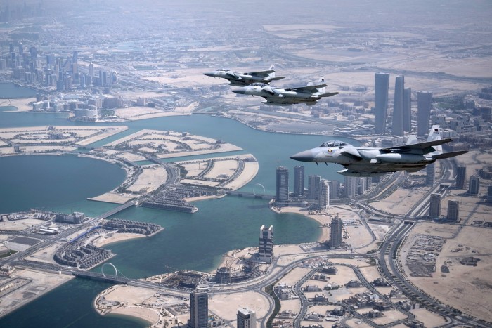 Qatari air force escorts the plane transporting President Donald Trump as it prepares to land in Doha from Saudi Arabia