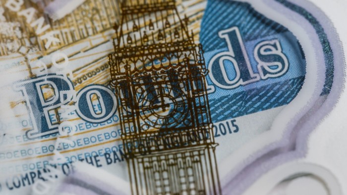 A montage of Big Ben in the foreground and a £5 note in the background