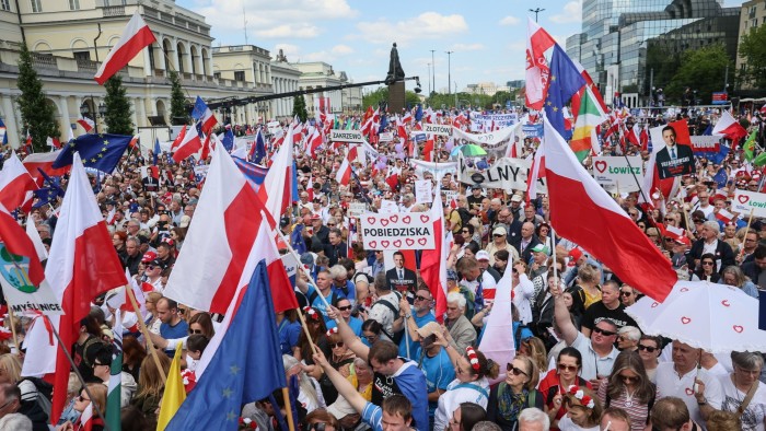 Supporters of Polish presidential candidate Rafal Trzaskowski at the start of the Great Patriots March in Warsaw on May 25