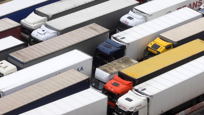 Haulage trucks queue to check in for a ferry crossing at the Port of Dover