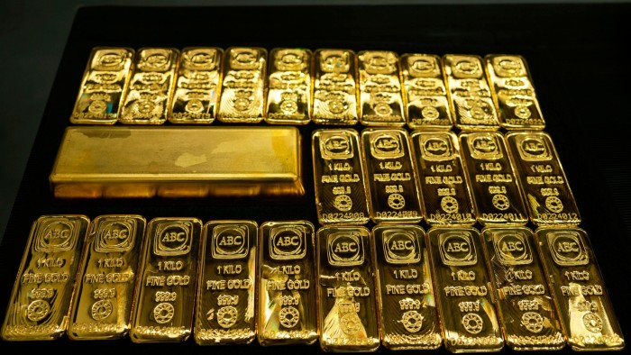 Gold sells off as US-China trade talks progress