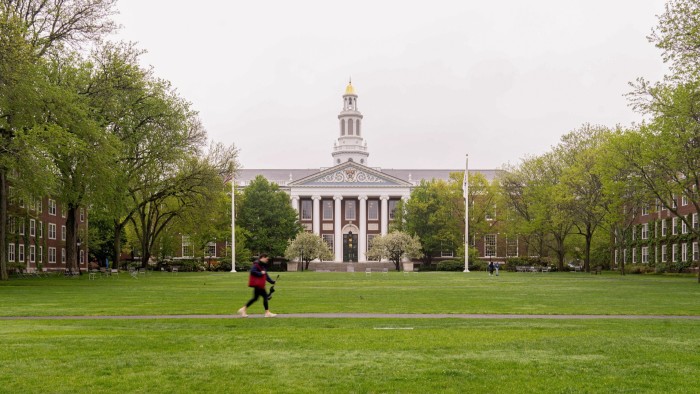 Baker Library at Harvard Business School is shown, featuring a grand facade with columns and a clock tower