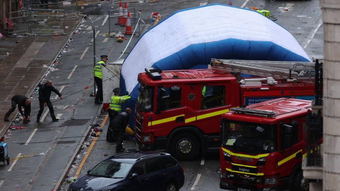The scene in Water Street after a car collided with Liverpool supporters