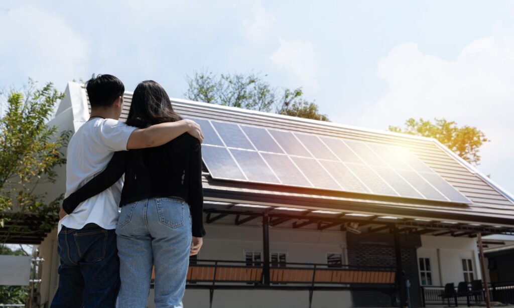 Couple looking at solar panels.