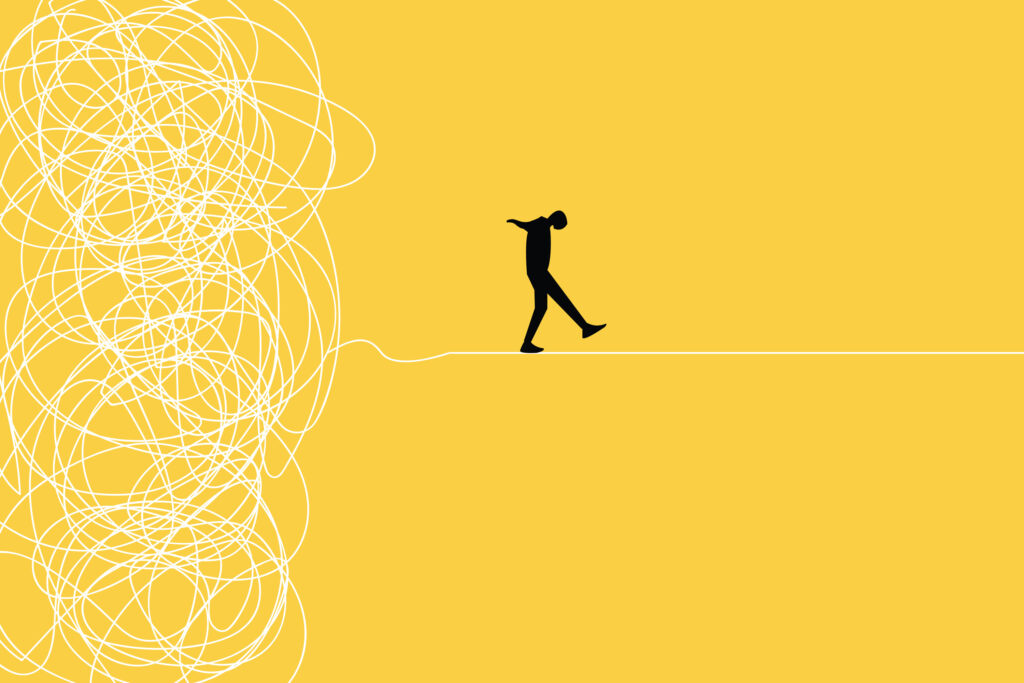 A bright yellow square, with a jumbled white line on the left, untangled and a tightrope on the right, with the silhoette of a man walking on the rope, signifying organization from entropy or chaos.