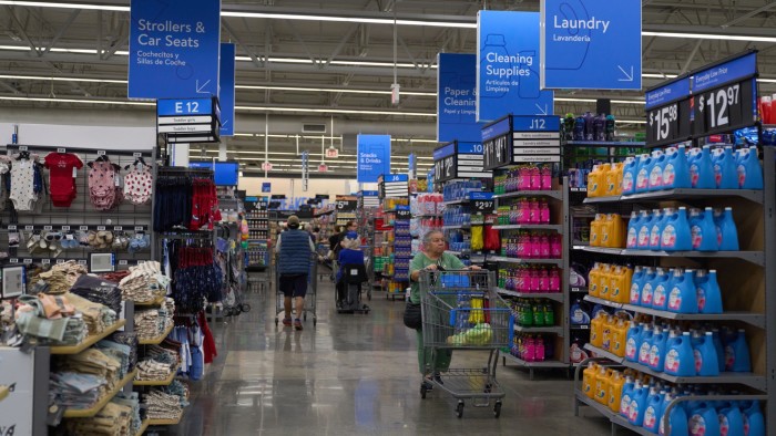 People shop in a Walmart store in Los Angeles