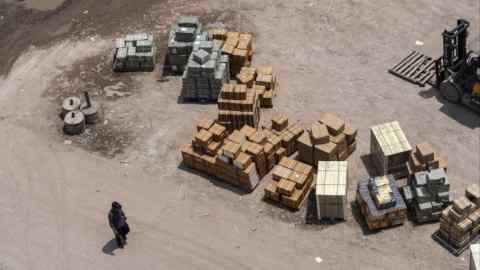 Boxes of goods in a loading area at an industrial park in Yiwu, Zhejiang Province, China