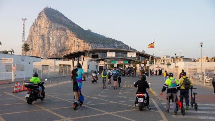 Workers cross the border from Spain to Gibraltar