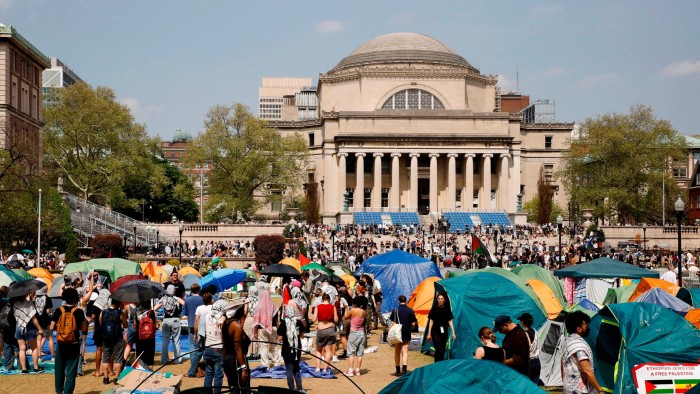 Student protesters gather inside their encampment on the Columbia University campus, April 29 2024 in New York