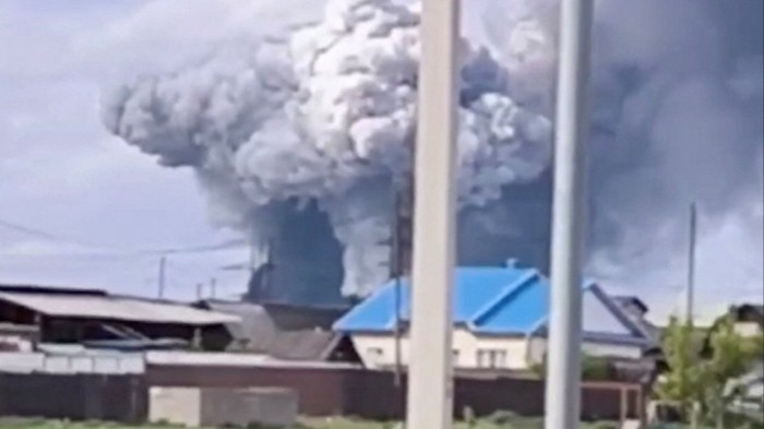 Smoke rises over Sredny in Russia’s Irkutsk region after a drone strike