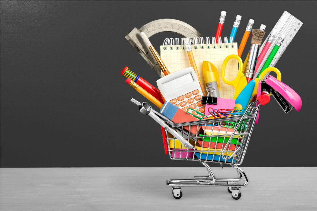shopping cart full of school supplies