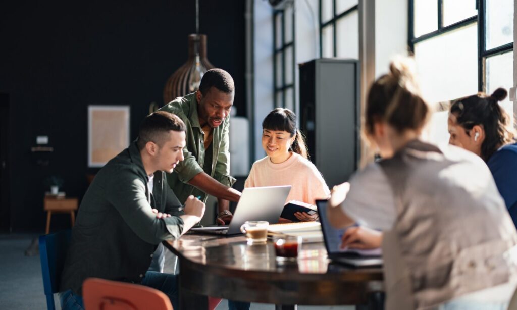 People working around a table.
