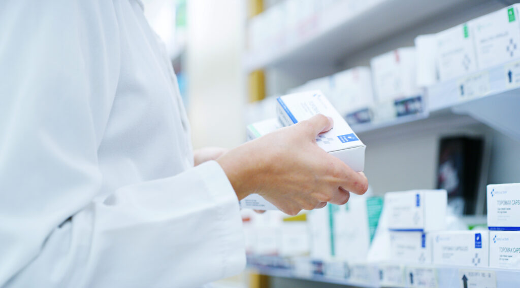 Doctor, hands or shelf with medication at pharmacy for inventory.
