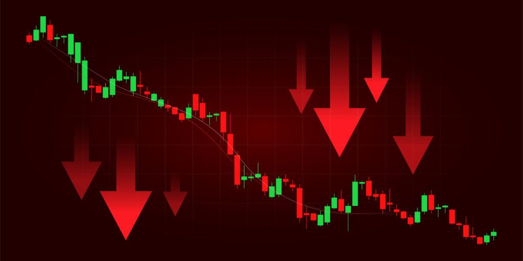 red green candles lower red arrows down