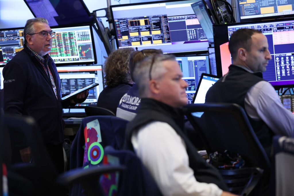 Stocks Close Higher as Investors Brush Aside Concerns About Trump's Latest Fed Move; Nvidia Earnings on Deck