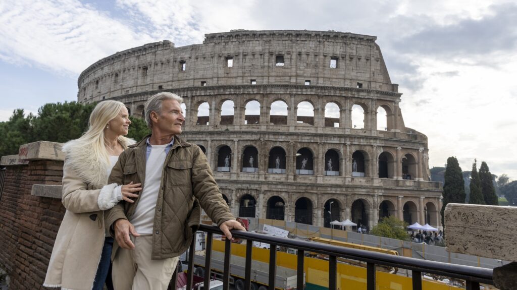 A senior couple traveling in Italy.