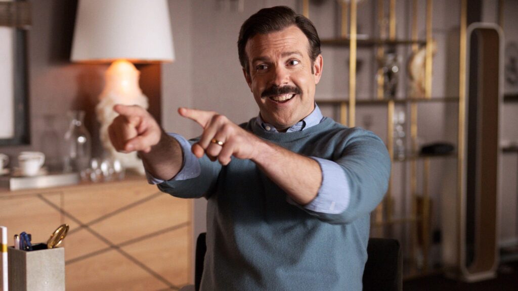 Jason Sudeikis as Ted Lasso.