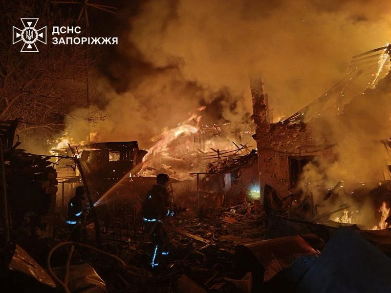 Russian attacks on Ukraine kill two, set private homes on fire