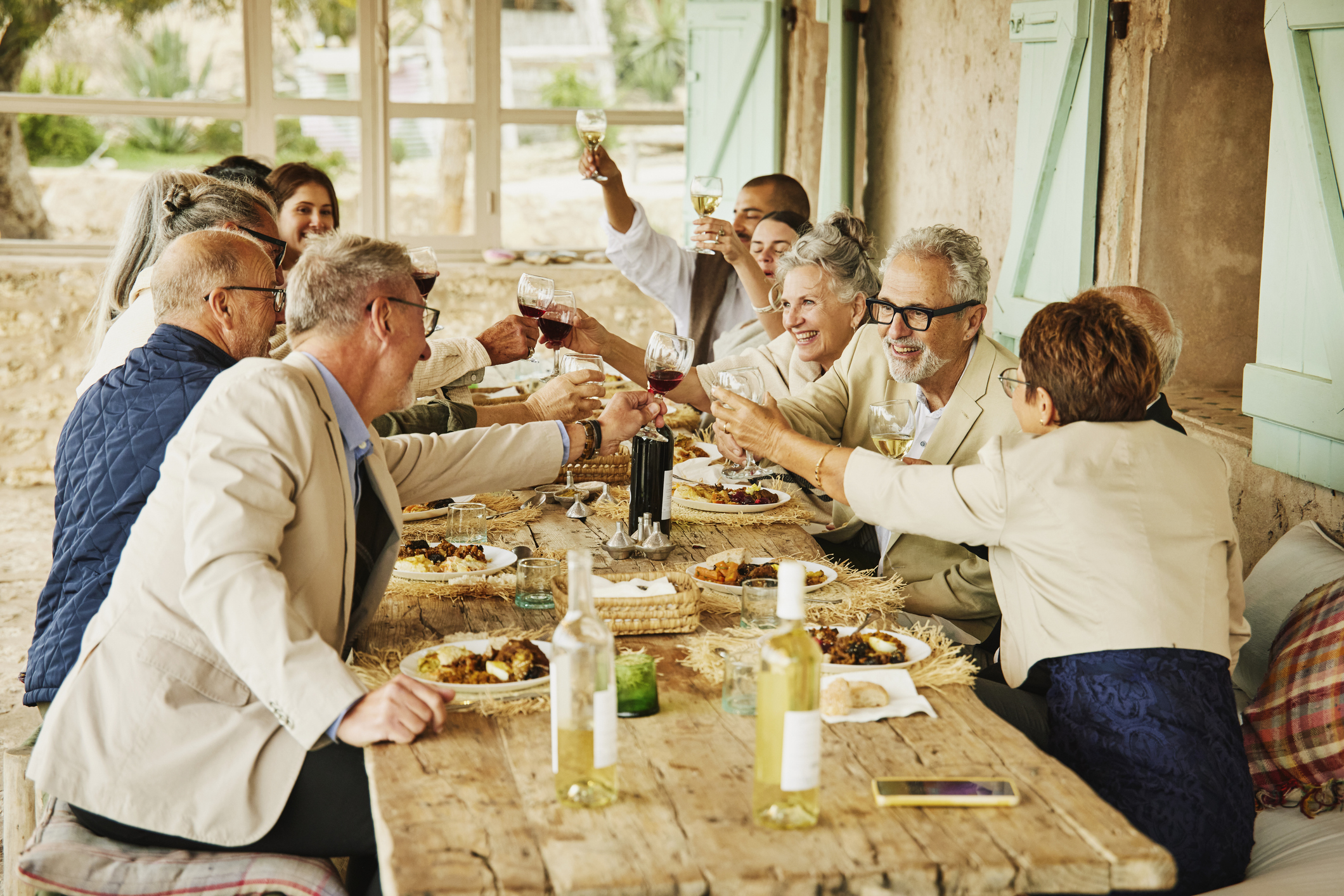 A group of friends enjoying dinner at a winery
