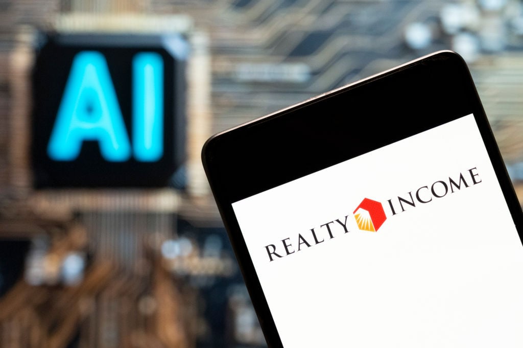 Realty Income's logo on a mobile phone.