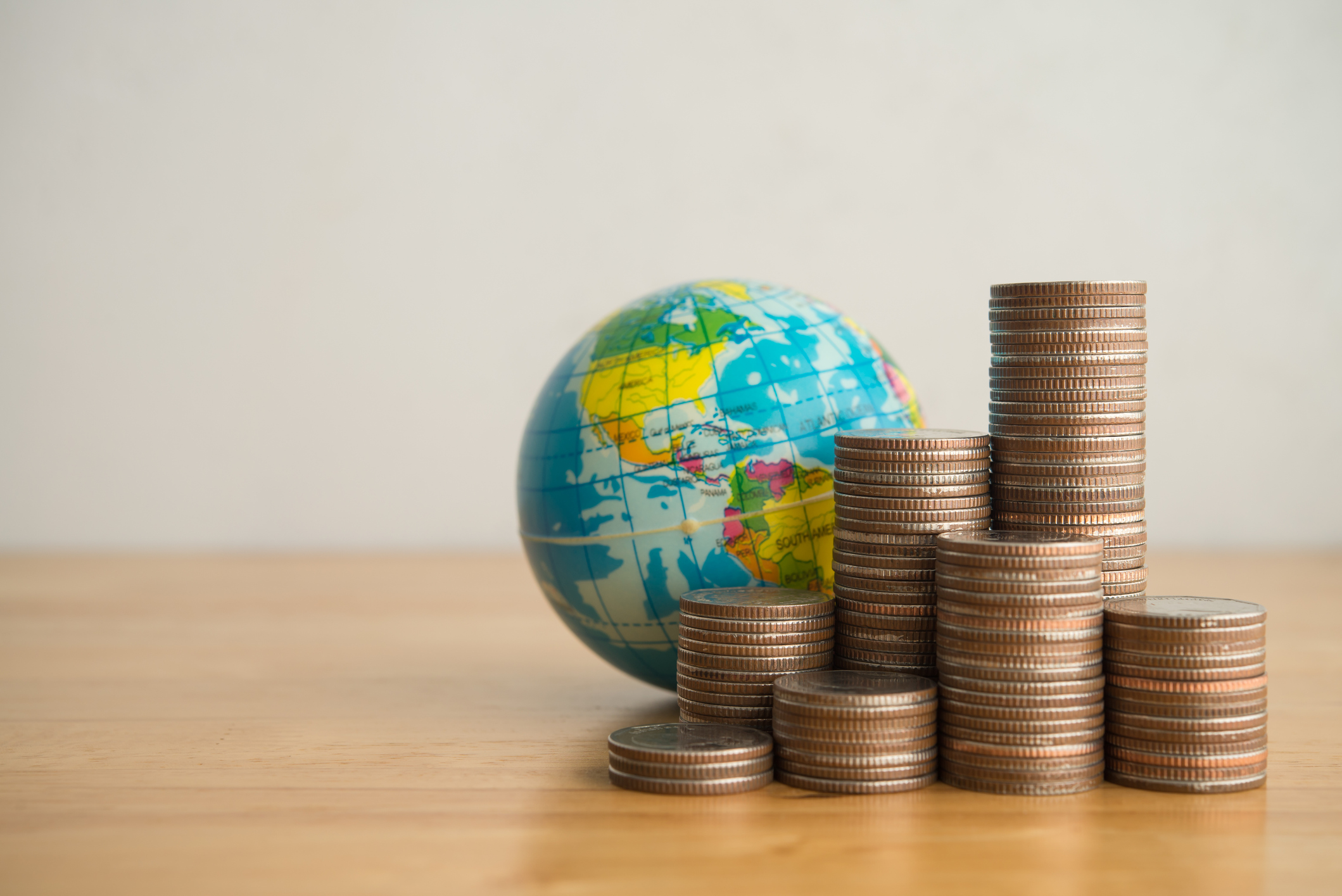 coins globe investment bonds around the world