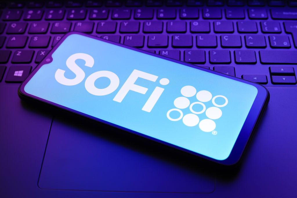 The SoFi Technologies, Inc. logo appears on a smartphone screen