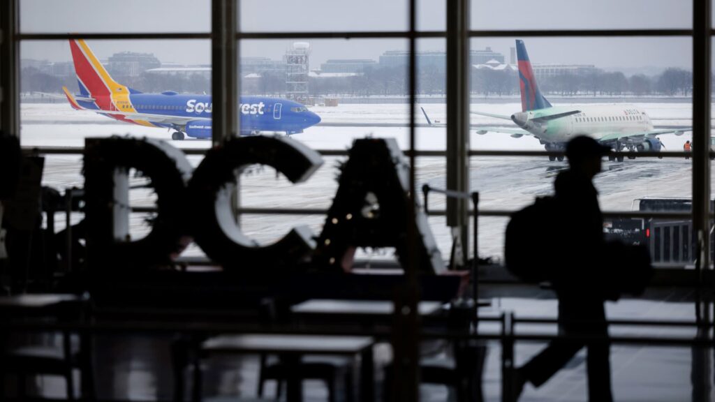 Airlines cancel 13,000 flights as winter storm sweeps U.S.