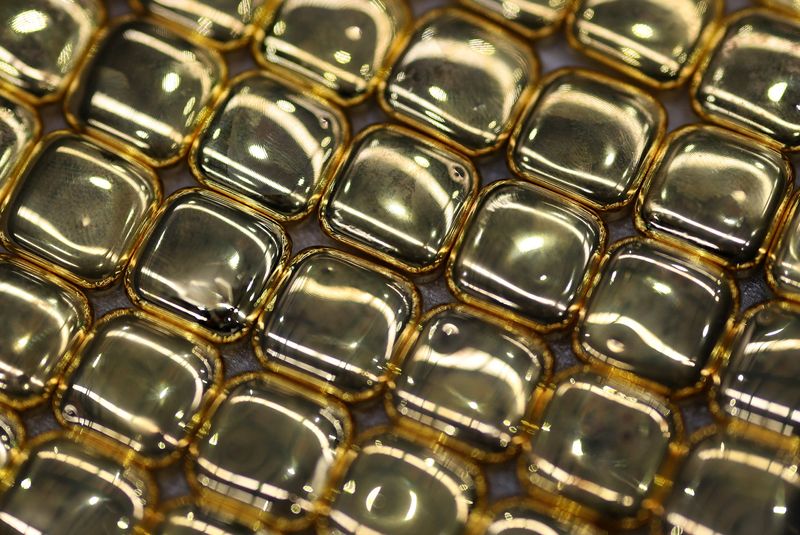 Gold blasts past $5,000 to record high on safe-haven rush