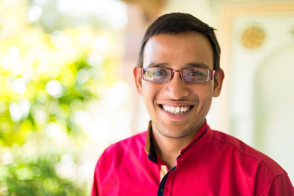 A closeup of a smiling person.
