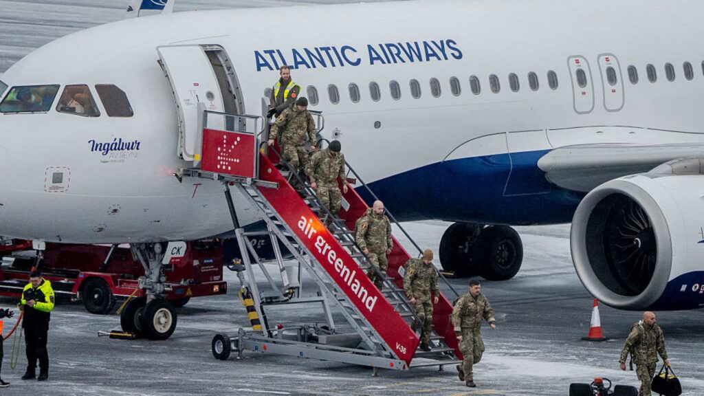 Trump shrugs off EU push back as Denmark sends troops to Greenland