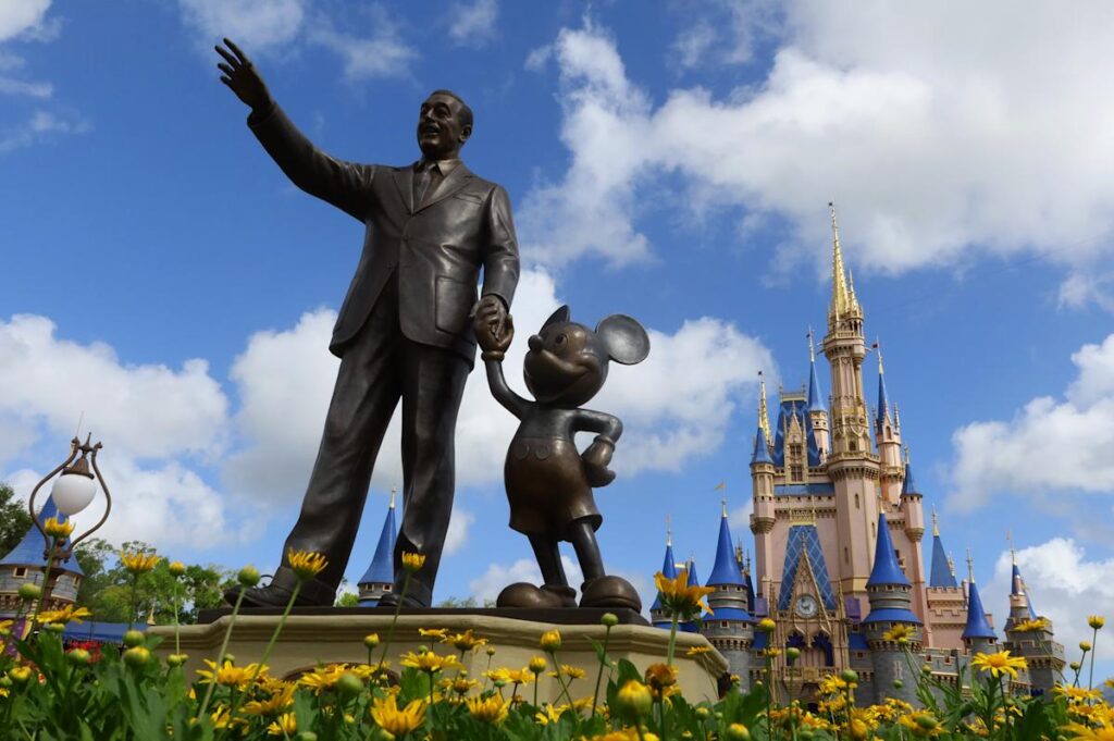 Disney reports profit hit on higher costs, while parks business shines as CEO search narrows