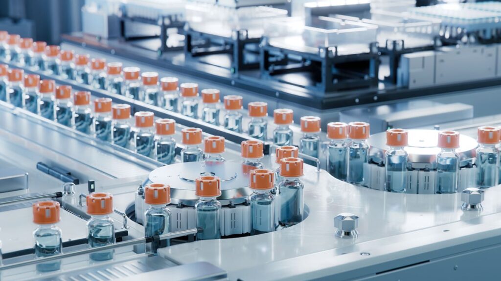 Pharmaceutical production line filling vials.