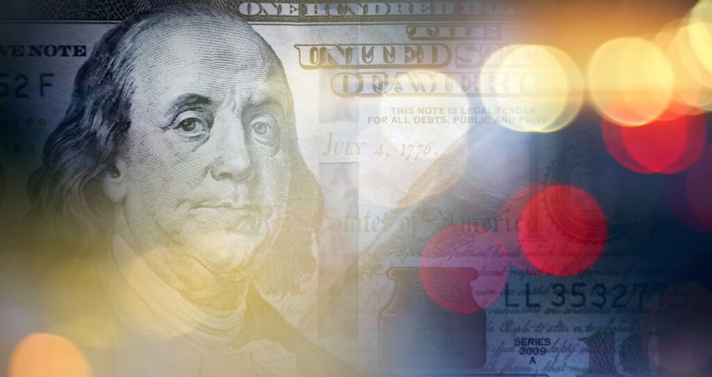 A $100 bill with lights superimposed on it.