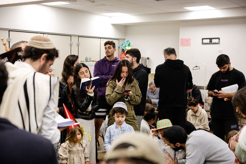 Israel shuts schools, bans gatherings as Iran launches retaliatory missiles