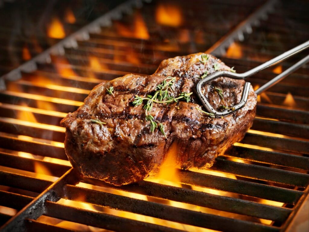 A steak on a grill.