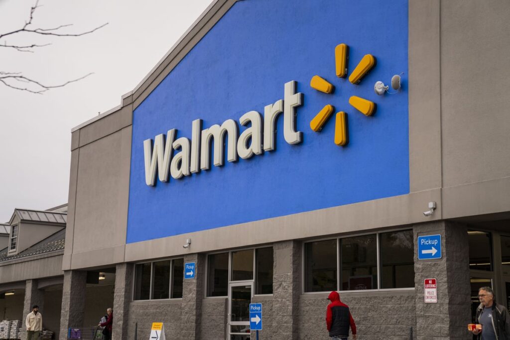 Walmart sign on building.