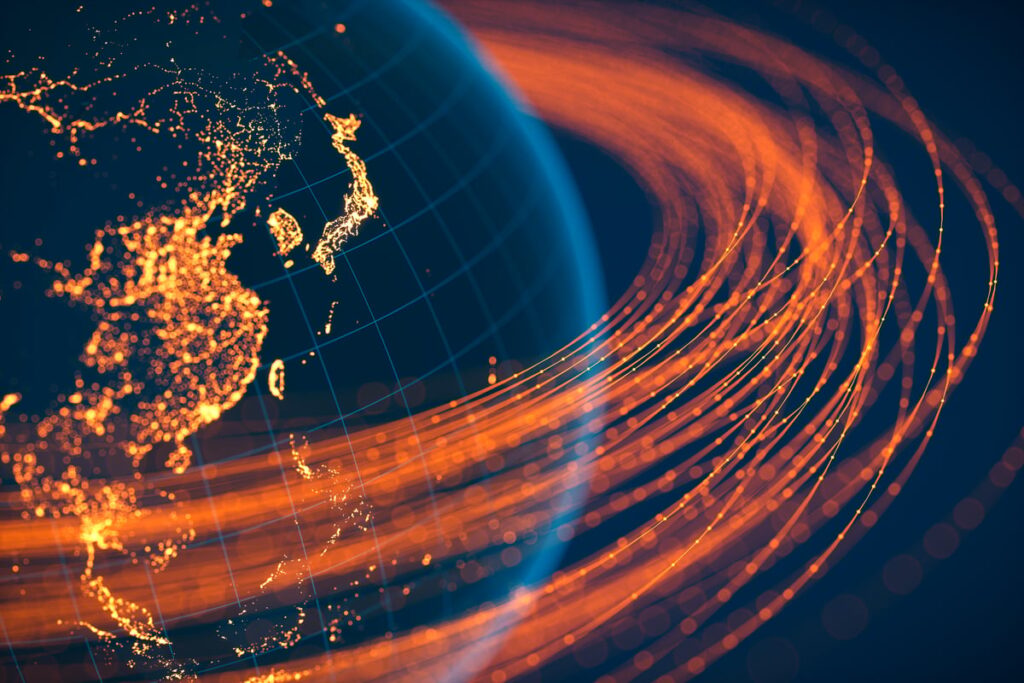 A rendering of a satellite view of Asia with orbital paths of satellites in orange.