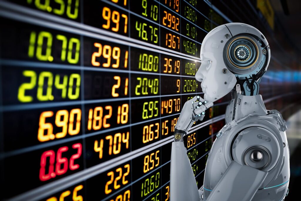 A humanoid robot looking at stock quotes with it's hand under its chin as if in deep thought.