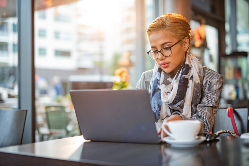 A person at a laptop.