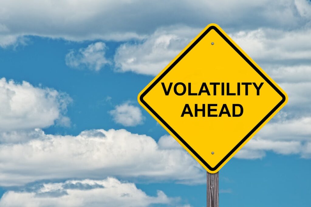 Road sign saying volatility ahead.