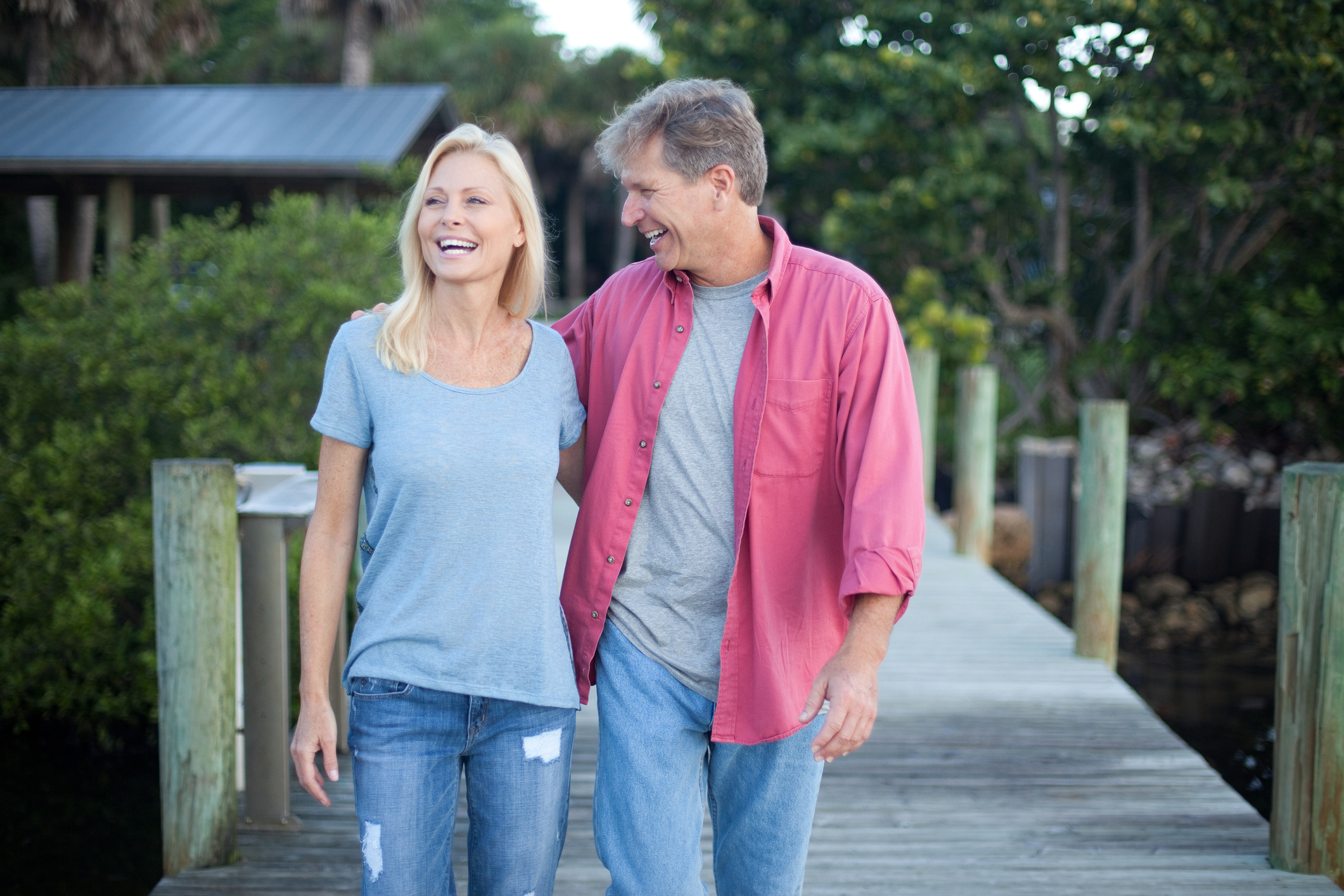 A mature couple on a dock in Florida.
