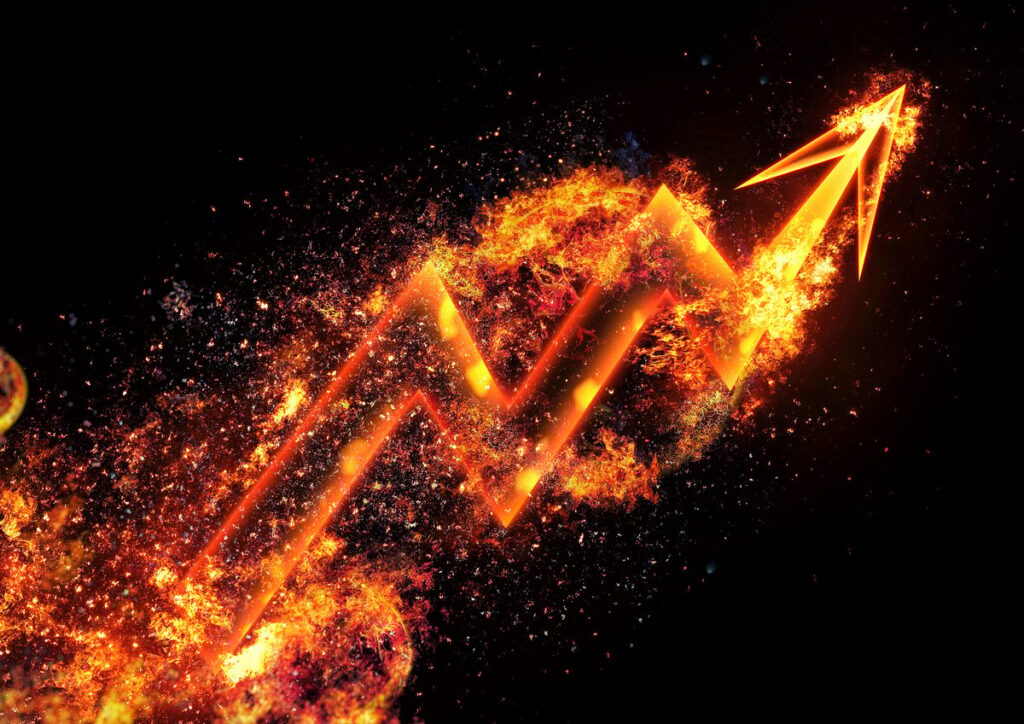 A flaming chart line moving up.